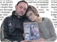  ??  ?? Difficult memories: Gina Murray and son Gary with a picture of daughter Leanne, who was 13 when she was killed in the Shankill atrocity