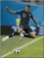  ?? NATACHA PISARENKO — THE ASSOCIATED PRESS ?? France’s Kylian Mbappe plays the ball against Belgium on July 10.