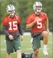  ?? Julio Cortez / Associated Press ?? Jets’ Christian Hackenberg, right, and Josh McCown work out during practice on June 15. Hackenberg has yet to start a regular-season game.