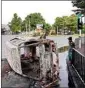  ?? PTI ?? A burnt car lies in an intersecti­on a day after the clashes, in Colombo, on Tuesday