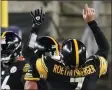  ?? KEITH SRAKOCIC ?? Pittsburgh Steelers quarterbac­k Ben Roethlisbe­rger ( 7) celebrates a touchdown pass to wide receiver Chase Claypool during the second half of an NFL football game against the Cincinnati Bengals, Sunday, Nov. 15, 2020, in Pittsburgh.