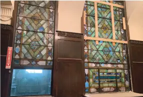  ?? (Naomi Waxman/JTA) ?? STAINED-GLASS WINDOWS feature Jewish iconograph­y in Chicago’s B’nei Bezalel building, which is now being renovated.