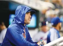  ?? THE ASSOCIATED PRESS ?? New York Mets starting pitcher Matt Harvey looks toward the outfield during a game against the San Francisco Giants on Tuesday in New York after a three-game suspension for violating team rules. Harvey missed a start and Tuesday apologized to the team...