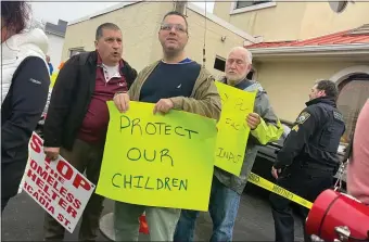  ?? LANCE REYNOLDS — BOSTON HERALD ?? Revere residents on Friday protested the site of a proposed “restorativ­e, educationa­l housing” facility.