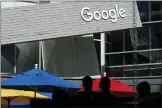  ?? JEFF CHIU-ASSOCIATED PRESS FILE ?? People walk by a Google sign on the company’s campus in Mountain View, Calif., on Sept. 24, 2019.
