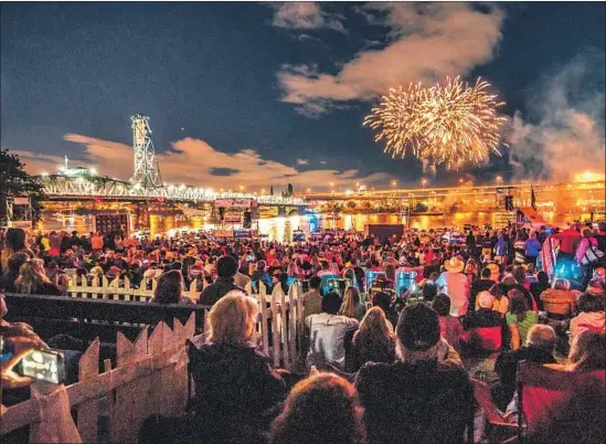  ?? Brit Forbes ?? FIREWORKS explode over Portland, Ore., during the Waterfront Blues Festival. This year, Robert Randolph and the Family Band will play before the fireworks show.