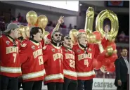  ?? AARON ONTIVEROZ — THE DENVER POST ?? Denver Pioneers hockey players Aidan Thompson (7), Massimo Rizzo (13), Mckade Webster (6), Connor Caponi (22) and Jack Devine (4) sing John Denver’s “Rocky Mountain High” during a celebratio­n of the Pioneers’ record-setting 10th national championsh­ip at Magness Arena on the DU campus on Monday, April 15, 2024.