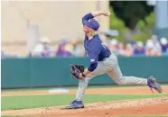  ?? Brandon Wade/Associated Press ?? TCU’s Kole Klecker set a career high in strikeouts in leading the Horned Frogs to a Game 1 victory.