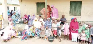  ?? ?? A cross section of displaced people at a camp