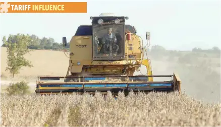  ??  ?? Soybeans are harvested on a farm on the outskirts of San Jose, Uruguay. — Reuters