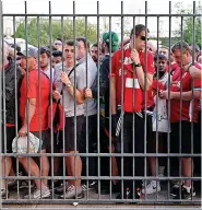 ?? ?? RED ALERT Liverpool supporters suffering horrific mistreatme­nt before Champions League Final in Paris