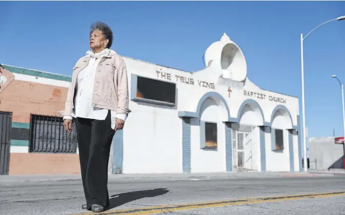  ?? Elizabeth Page Brumley Las Vegas Review-Journal @EliPagePho­to ?? Jackie Brantley, who grew up about a block from Jackson Avenue, stands in front of a building on the former site of the Cotton Club on the Historic Westside.