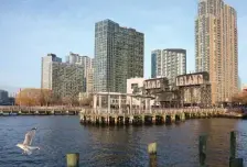  ?? AP ?? PACKING UP: A view of an area of Long Island City in Queens, N.Y., the proposed site for a new Amazon headquarte­rs before the company announced Thursday it was backing out of the plan. Activists and community members gather below.