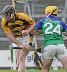  ??  ?? Paddy Whiteley of Glynn-Barntown is tackled by Matthew Joyce.