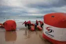  ?? The Guardian ?? Surf life savers set up for the opening Duel in Pool race – in the open water off Bondi beach. Photograph: Jessica Hromas/