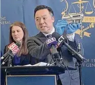  ?? John Moritz/ Hearst Connecticu­t Media Group ?? Attorney General William Tong displaying one of the parts that his office alleges was shipped into Connecticu­t by an out-of-state manufactur­er, in violation of the state’s ban on unserializ­ed “ghost” guns.