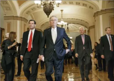  ??  ?? Senate Minority Leader Mitch McConnell of Ky., center, flanked by Sen. John Barrasso, R-Wyo., left, and Senate Minority Whip John Cornyn of Texas, right, arrive for a news conference Sept. 16 on Capitol Hill in Washington. All along, the biggest...