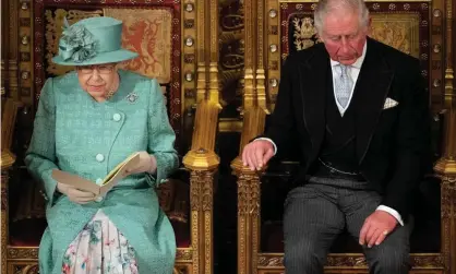  ??  ?? The Queen delivering her speech, flanked by Prince Charles, during the state opening of parliament. Photograph: Leon Neal/AFP via Getty Images