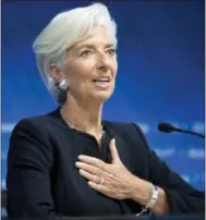  ?? RODRIGO ABD — THE ASSOCIATED PRESS FILE ?? Internatio­nal Monetary Fund chief Christine Lagarde answers a question during a news conference in Lima, Peru.