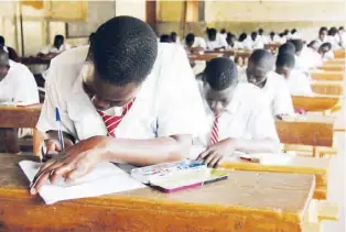  ??  ?? FILE PHOTO: Pupils writing exams