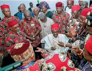  ?? PHOTO: REUTERS ?? Nigeria’s President Muhammadu Buhari receives honours and gifts from local leaders during his tour of Ebonyi state in the country’s southeast.
