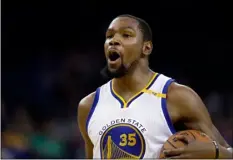  ?? AP PHOTO ?? In this Jan. 10 file photo, Golden State Warriors’ Kevin Durant reacts after a foul called against him during the second half of the team’s NBA basketball game against the Miami Heat, in Oakland.