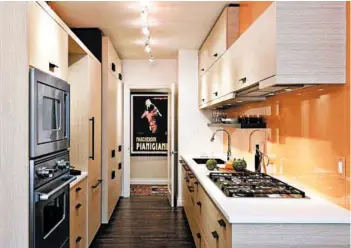  ??  ?? Galley kitchens are great for smaller homes or apartments because they take up less room than an eat-in kitchen.