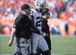  ?? Heidi Fang ?? Las Vegas Review-journal @Heidifang Raiders cornerback David Amerson leaves the field in the first half of a game against the Broncos on Oct. 1 in Denver.