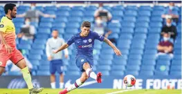  ??  ?? Chelsea's US midfielder Christian Pulisic scores the opening goal during their match against Manchester City at Stamford Bridge on Thursday