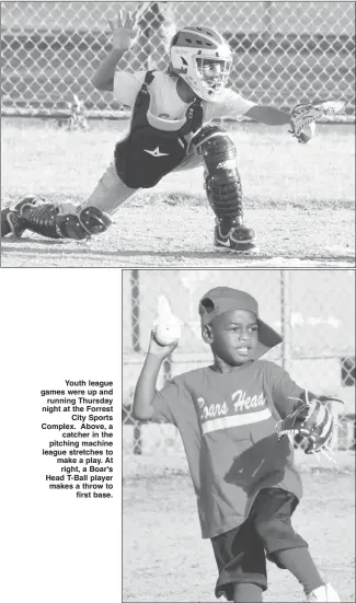  ?? Fred Conley • Times-Herald ?? Youth league games were up and running Thursday night at the Forrest City Sports Complex. Above, a catcher in the pitching machine league stretches to make a play. At right, a Boar's Head T-Ball player makes a throw to first base.