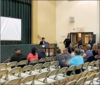  ?? NICHOLAS BUONANNO — NBUONANNO@TROYRECORD.COM ?? Green Island Mayor Ellen McNulty-Ryan speaks about why the village wanted to host a heroin awareness town hall meeting.