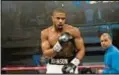  ?? Barry Wetcher / AP ?? Michael B. Jordan stars as Adonis Johnson in “Creed III.”