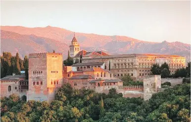  ?? DOMINIC ARIZONA BONUCCELLI ?? The edge of the tangled Moorish quarter in Granada, Spain, is a fine viewpoint for watching the sun set over the Alhambra, which seems to glow with its own light.