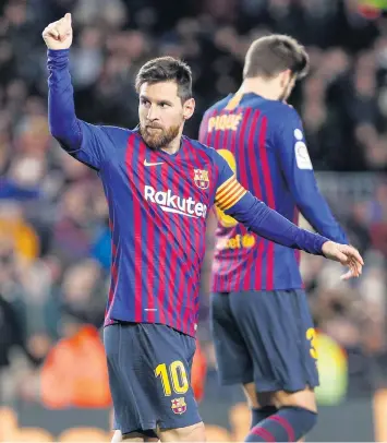  ?? GETTY IMAGES ?? Lionel Messi celebra tras anotar su gol 400 en la liga española.