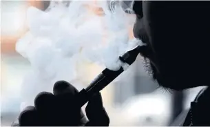  ?? NAM Y. HUH THE ASSOCIATED PRESS FILE PHOTO ?? Health officials warn of a public health crisis from widespread use of e-cigarettes by youth.