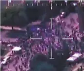  ?? AP ?? File image from a video released by the Department of Defense shows a protest on a street as captured by an RC-26 reconnaiss­ance plane.
