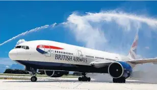  ?? CARLINE JEAN/STAFF PHOTOGRAPH­ER ?? British Airways celebrates its new route between Fort Lauderdale-Hollywood Internatio­nal Airport and London’s Gatwick Airport as the first plane arrives in Fort Lauderdale on Thursday.