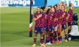  ?? Photograph: Icon Sportswire/Getty Images ?? The US women’s national team stand for the anthem before Monday’s internatio­nal friendly against Mexico at Rentschler Field in East Hartford, Connecticu­t.