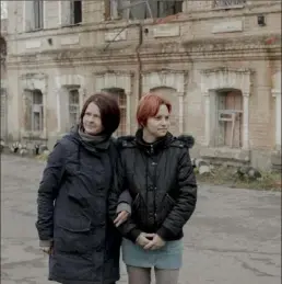  ?? Emile Ducke/The New York Times ?? Viktoria Borysenko, left, and her sister-in-law, Nadia Borysenko, in Balakliya, Ukraine, Nov. 4.. When Russians occupied the city, they took the women’s children to a summer camp and have not returned them.