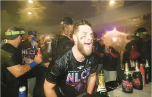  ?? YOUNG KIM/THE PHILADELPH­IA INQUIRER ?? Bryce Harper celebrates after the Phillies beat the Atlanta Braves on Saturday to advance to the National League Championsh­ip Series, where they will face the San Diego Padres.