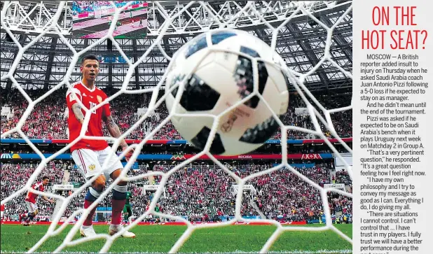  ?? — GETTY IMAGES ?? Russia midfielder Denis Cheryshev (not pictured) scores a goal to put the host nation ahead of Saudi Arabia at yesterday’s World Cup opener at Luzhniki Stadium in Moscow. Russia won the match handily by a score of 5-0.