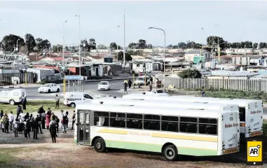  ?? PICTURE: HENK KRUGER/AFRICAN NEWS AGENCY (ANA) ?? STRIKE ACTION: Commuters wait for transport on the outskirts of Nyanga yesterday as Golden Arrow suspended its bus services.