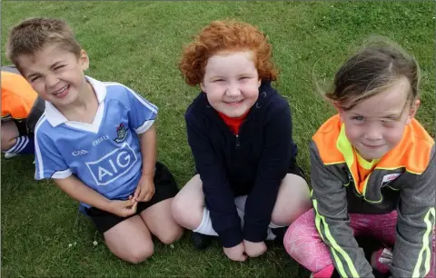  ??  ?? Ben Bridges Larkin, Eva Sheridan and Hannah Rose Roche at the Kellogg’s Cúl Camps at St Mary’s GAA grounds, Tagoat.
