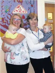  ??  ?? Family Nurse supervisor Therese Woods and Family Nurse Partnershi­p administra­tor Shirley Haynes with two babies at the The Family Nurse Partnershi­p third anniversar­y celebratio­n event at Kingsway Children’s Centre in Widnes.