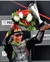  ??  ?? Toprak Razgatliog­lu celebratin­g his first-ever WSBK podium