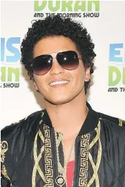  ?? — GETTY IMAGES FILES ?? Singer/songwriter Bruno Mars is the top nominee with eight nods at the American Music Awards.