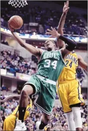  ?? Michael Conroy/associated Press ?? Celtics forward Paul Pierce scored 24 points to lead Boston to a statement victory over the up-and-coming Pacers in Indiana.