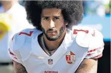  ?? [AP PHOTO/ TED S. WARREN, FILE] ?? Then-San Francisco 49ers quarterbac­k Colin Kaepernick began kneeling on the sideline at games during the national anthem to protest social injustice and police brutality. Soon after, he was gone from the NFL, and he has not played since.