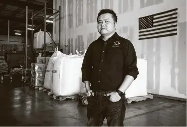  ?? Brett Coomer / Staff photograph­er ?? Jason Jing, owner of Hao Spice, stands in his spice company’s warehouse in Sugar Land. Tariffs imposed during the U.S.-China trade war spurred Jing to find suppliers from other parts of the world.