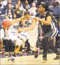  ?? Hearst Connecticu­t Media file photo ?? UConn’s Maya Moore drives to the basket against Purdue’s Antionette Howard during the Huskies’ second-round NCAA tournament game on March 22, 2011.